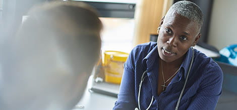 GP talking to patient's father